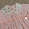 Macacão Bebê Menina na cor rosa