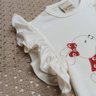 Conjunto Infantil Menina shorts na cor vermelho e blusa creme