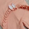 Macacão Bebê Menina na cor salmão