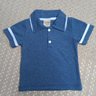 Conjunto Infantil Menino camiseta na cor azul jeans e shorts jeans