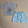 Conjunto Infantil Menino camiseta na cor mescla e shorts na cor azul