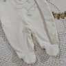 Macacão bebe neutro Inverno na cor creme