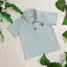 Conjunto infantil polo menino Camiseta gola polo em malha na cor verde shorts com regulagem na cintura em sarja creme com estampa e cinto na cor cru